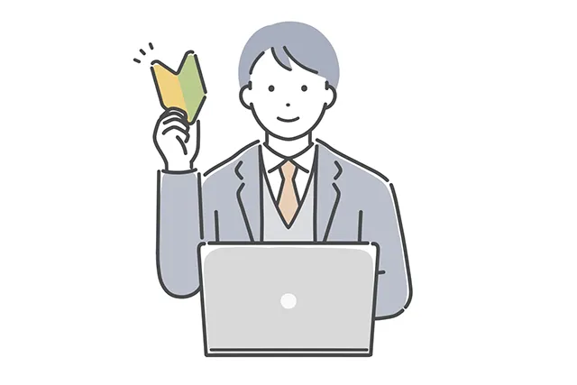 初心者マークを持つ男性