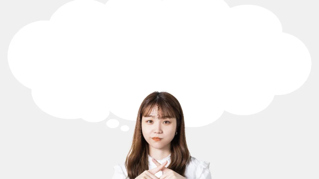 バツをする女性